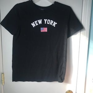Black “New York” t-shirt.